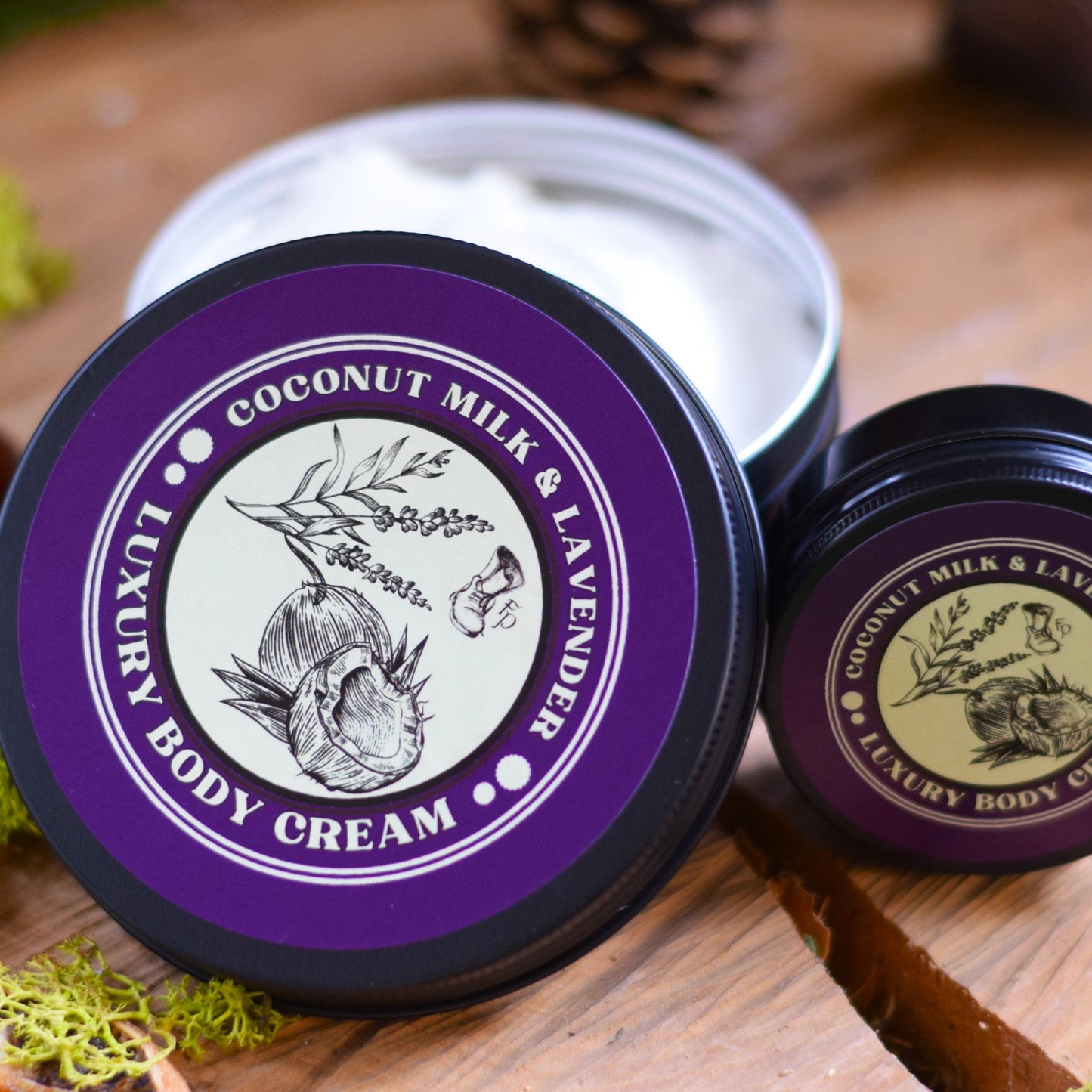 coconut milk & lavender luxury body cream on a wooden table surrounded by natural elements
