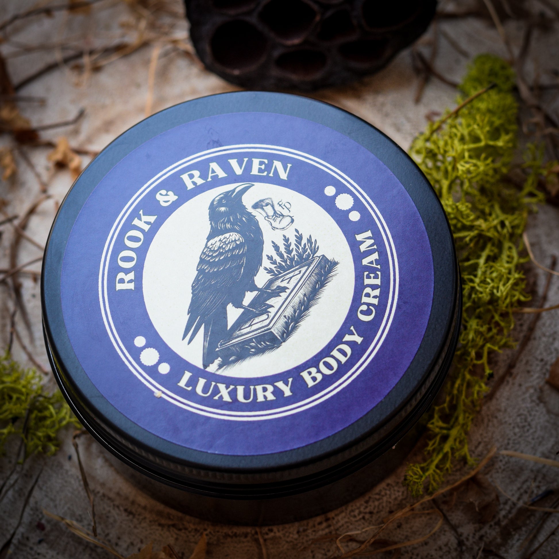 Rook & Raven Luxury Body Cream jar lid on a natural background