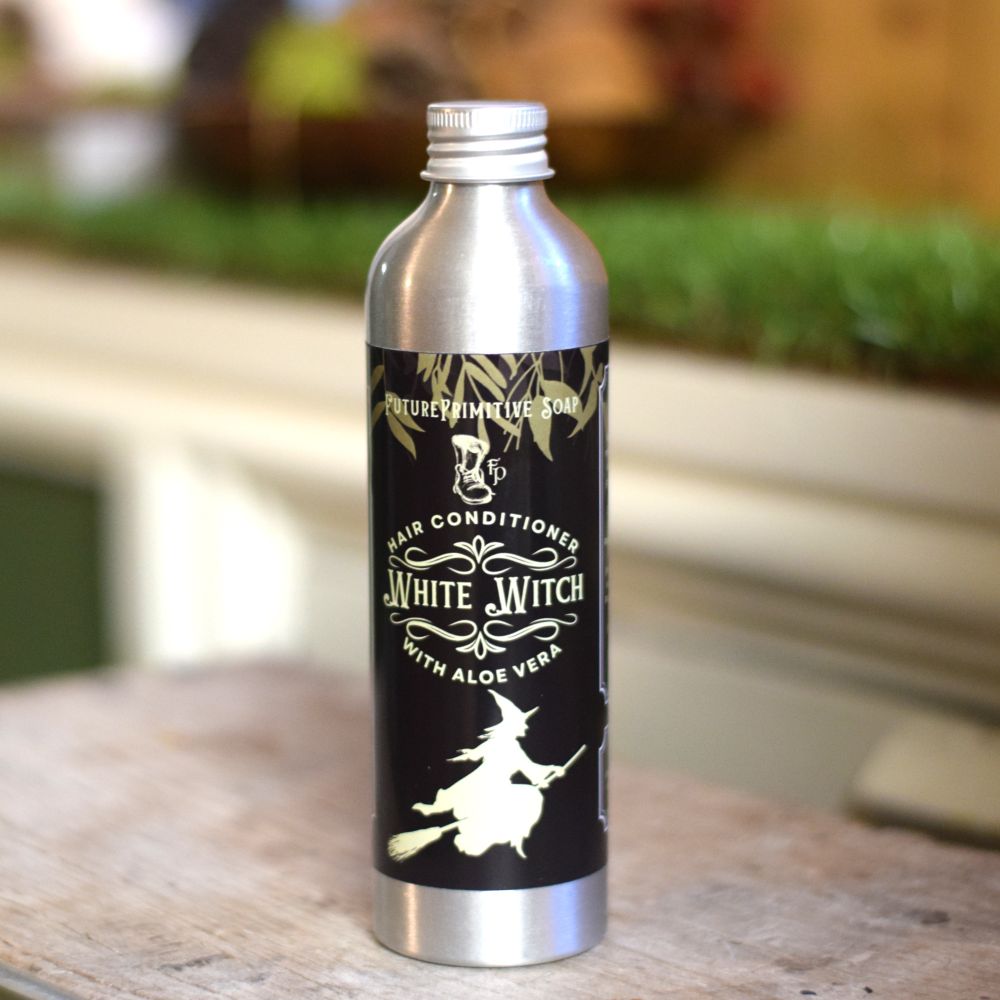 white witch hair conditioner in a full size aluminium bottle