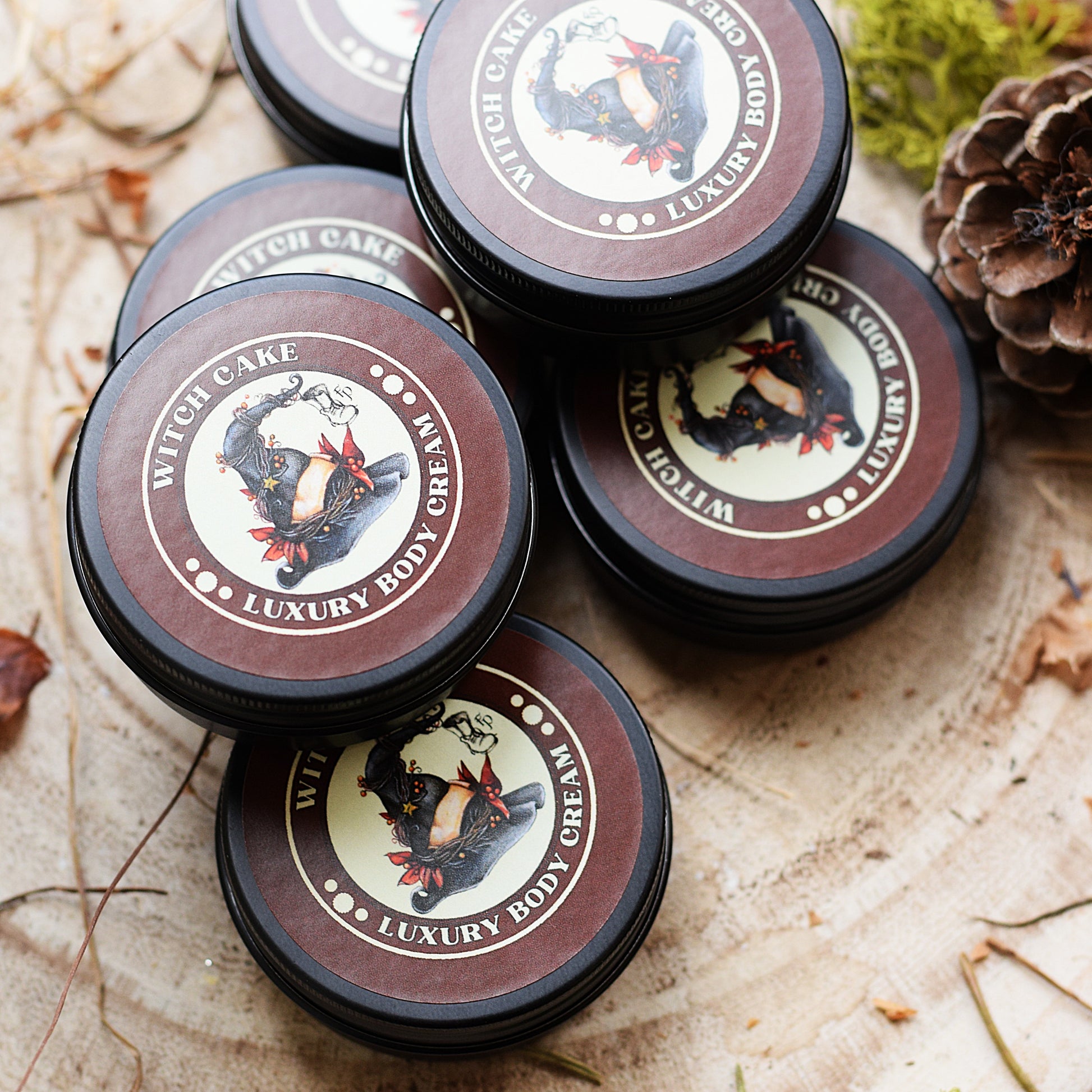 Witch Cake Luxury Body Cream jars on a natural background