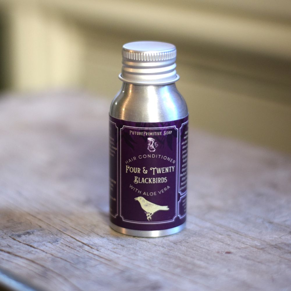 mini four & twenty blackbirds hair conditioner in a silver bottle