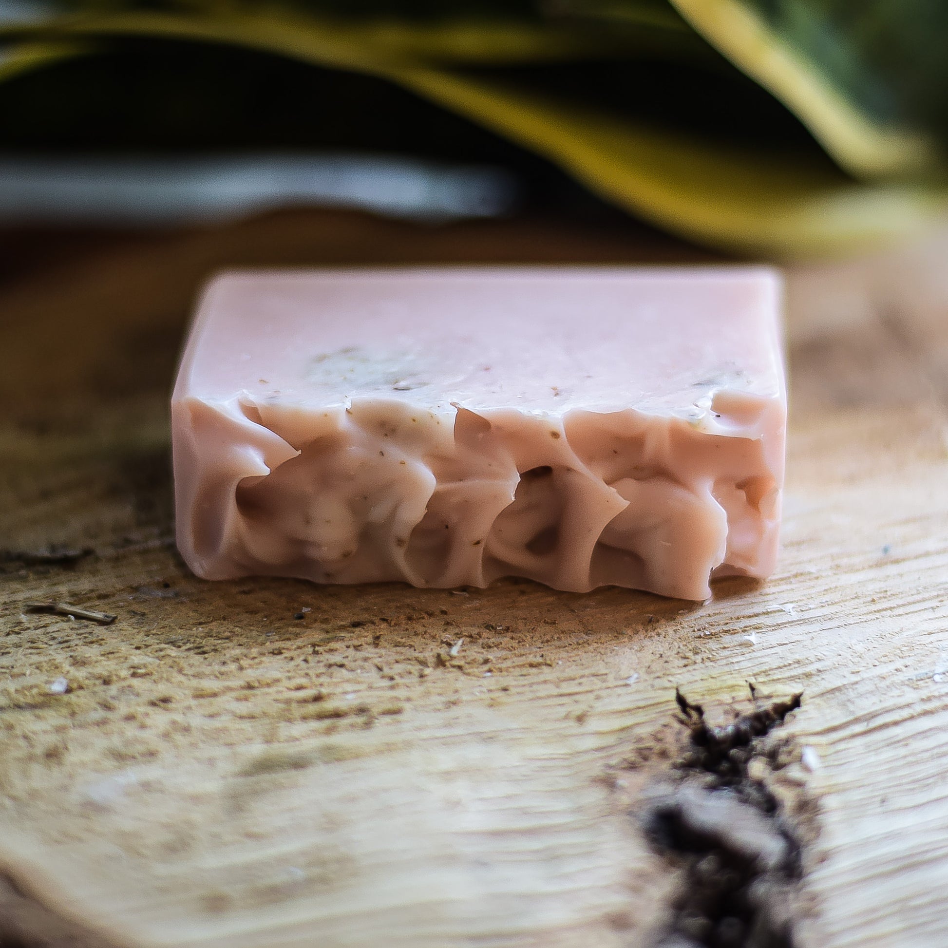 Bar of soap with a textured surface on a wooden surface
