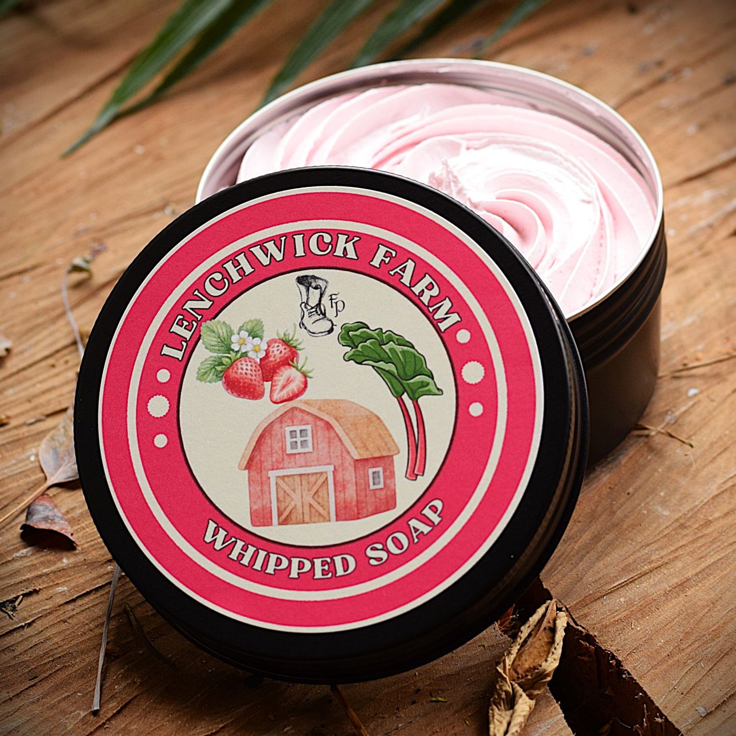 Lynchwick Farm whipped soap in a container on a wooden surface