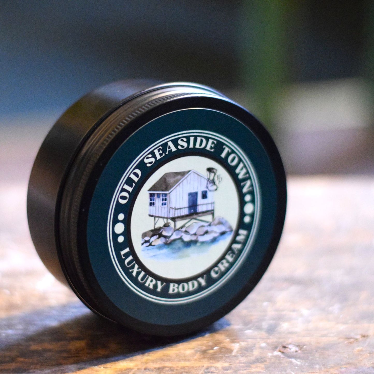 Jar of Old Seaside Towns Luxury Body Cream on a wooden surface