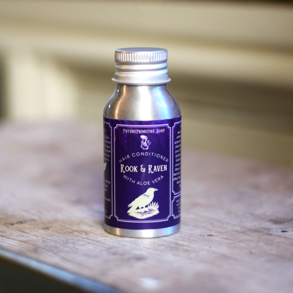 rook & raven hair conditioner mini on a wooden background